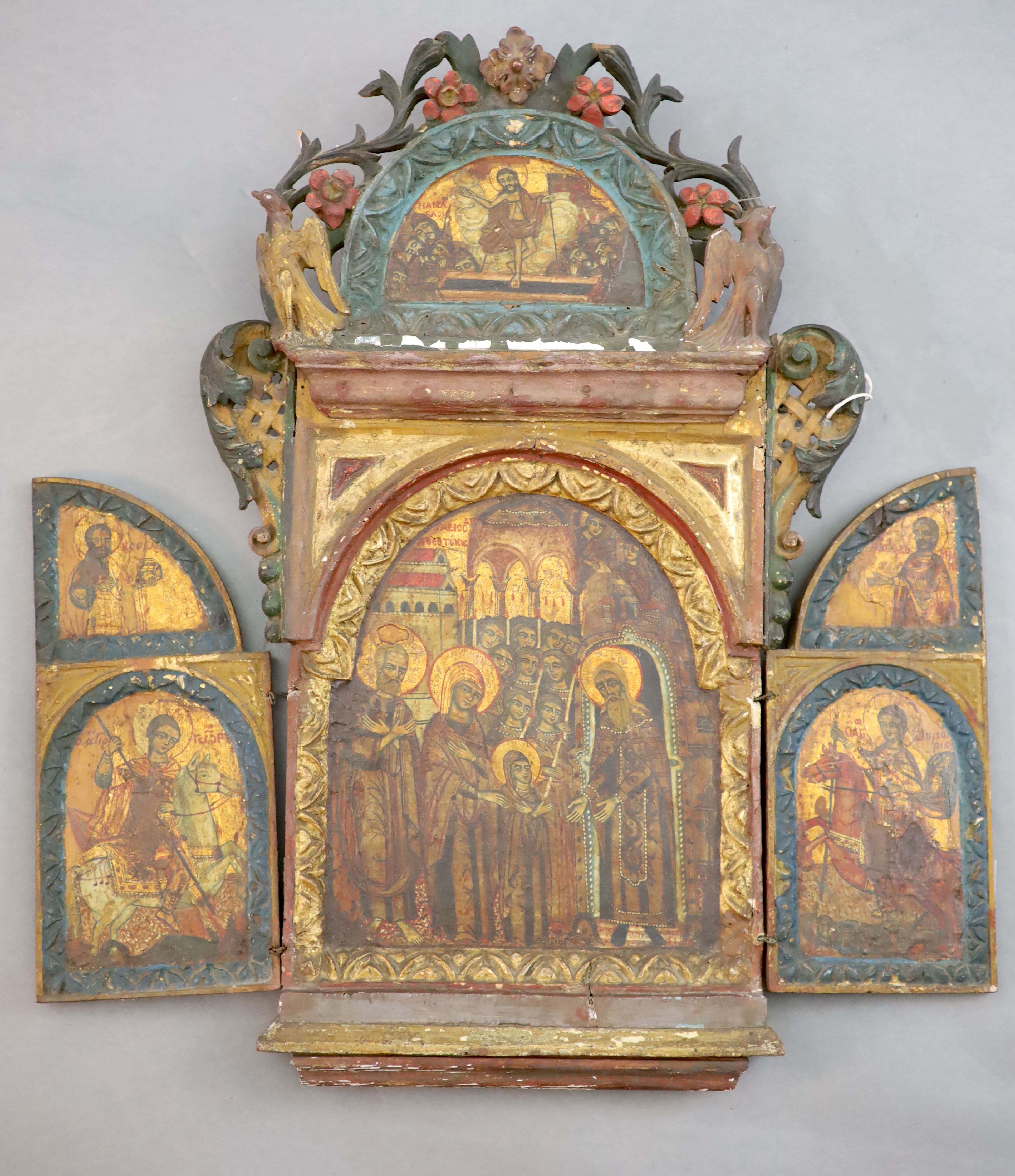 A 19th century Russian tempera on wood triptych icon, c.1800 25.5 x 16.5in. opens to 23.75in.